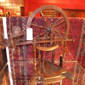 An old fruitwood spining wheel