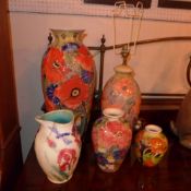 Three Moorcroft style vases a similar table lamp and a water jug