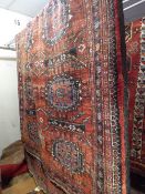 A fine old North East Persian Turkoman carpet 275 X 140 cm repeating elephant foot motifs on a