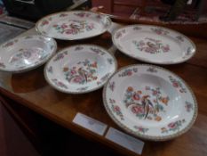 A collection of Whieldon ware 'Pheasant' pattern soup bowls and meat platters