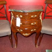 A Continental inlaid commode chest of small proportions fitted three drawers with gilt metal