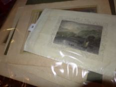 A collection of various unframed etchings and engravings