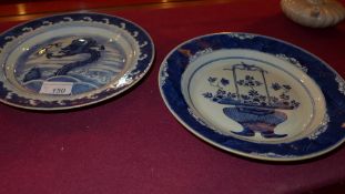 A Chinese blue and white plate decorated with a dragon and Koi carp and a similar plate ( 2 )