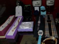 A collection of sterling silver jewellery and fashion watches including examples by Ben Sherman