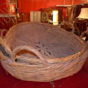 Two shallow form wicker baskets
