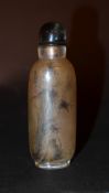 A Chinese inside painted snuff bottle decorated with landscapes