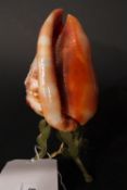 A C19th Conch table lamp with carved Classical scene of a maiden in relief and raised on cast iron