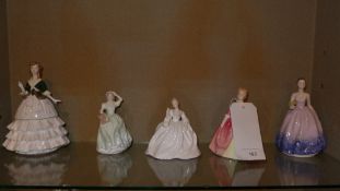 A collection of five figurines of ladies including a Royal Doulton figure 'Debbie' (two A/F)