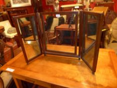 A mahogany triple dressing table mirror