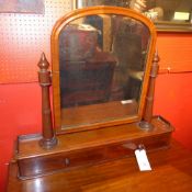 A Victorian mahogany dressing mirror in swing frame and fitted two drawers