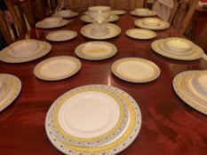 A Wedgewood part dinner service including gravy boat