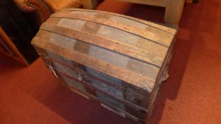 An early C20th dome top wood bound trunk