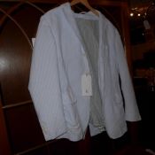 A gents Ralph Lauren polo seersucker jacket and similar trousers both in a blue stripe