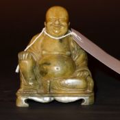A soapstone carving of a Buddha