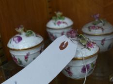 A Meissen set of four porcelain cups and