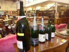 A collection of display bottles of champ