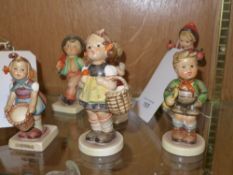 A collection of Hummel Goebel figures
