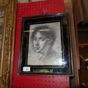 A charcoal portrait heightened in white
