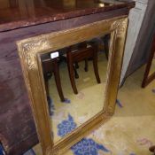 A gilt framed wall hanging mirror