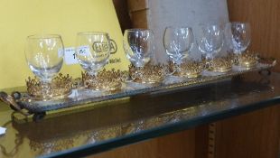 A 1920's French gilt metal and mirrored