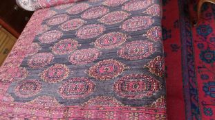 An extremely fine North East Persian Turkoman carpet 280cm x 179cm. Repeating Tekkeh goul motifs