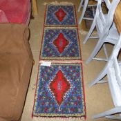 A Middle Eastern multi coloured rug and