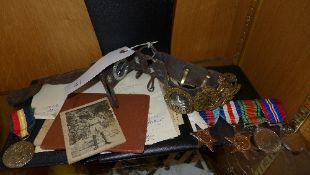 A collection of WWII service medals and
