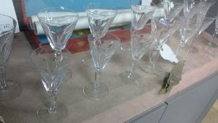 A collection of faceted drinking glasses