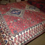 An Agra design carpet the terracotta gro
