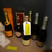 A collection of champagne including Veuv