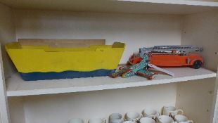 A 1950's Noahs ark, a red 1950's fire engine, a tinplate aeroplane and others