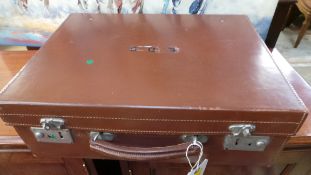 A 1920's leather suitcase