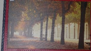 A large framed print of a cafe' exterior
