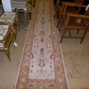 An Agra hand knotted runner the beige gr