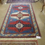 A hand knotted Persian rug the blue grou