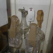A silver plated claret jug and three dec
