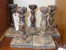 A set of five turned candlesticks