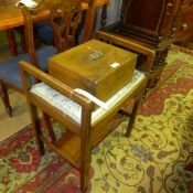 An Edwardian inlaid mahogany piano stool