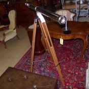 A chrome telescope on adjustable base