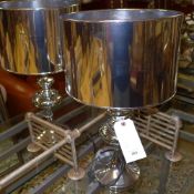 A pair of chromium table lamps with shad