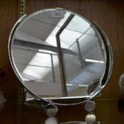 An early chrome bevelled circular dressi