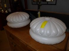 A pair of opaline glass ceiling shades