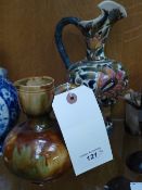 A Dunmore mottled glazed ewer and a similar