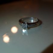 A 9ct white gold and diamond ladies ring