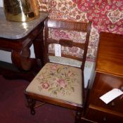 A pair of Georgian inlaid mahogany bar back side chairs with drop in seats and raised on turned