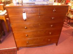 A C19th mahogany chest fitted two short and four long drawers with moulded knob handles