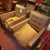 A pair of Art Deco armchairs of angular form in buttoned upholstery (cushon seat A/F)