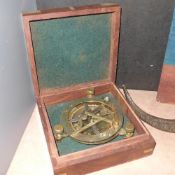 A cased sundial compass