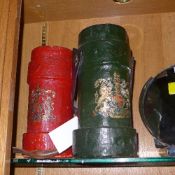 A pair of hand painted artillery shell c