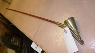 An ecclesiastical candle snuffer